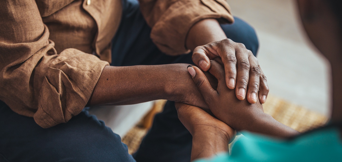 two people holding hands