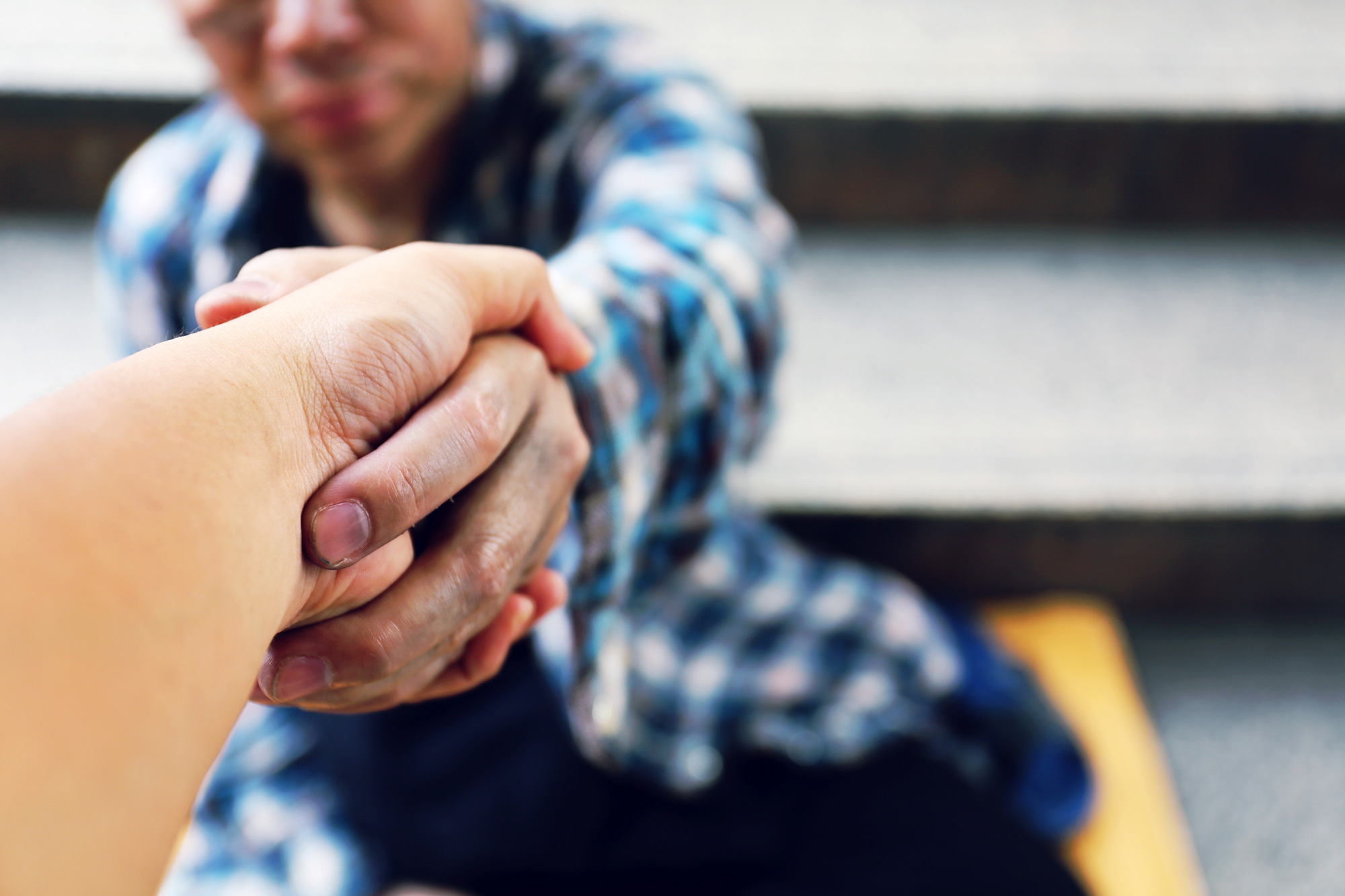 hand reaching out for help